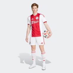 Koszulka piłkarska ADIDAS Ajax Amsterdam 25/26 domowa. Bluzki damskie Adidas, s, bez wzorów, sportowe, bez kołnierzyka, bez ramiączek. Za 459.99 zł.