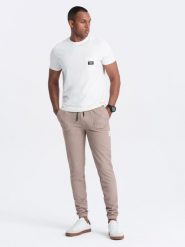 Męskie spodnie dresowe ze strukturalnej dzianiny - kawowe V2 OM-PASK-0211 - XXL. Spodnie dresowe męskie Ombre Clothing, z aplikacjami, z bawełny. Za 143.99 zł.