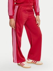 Adidas Spodnie dresowe Adibreak KQ8891 Czerwony Loose Fit. Czerwone spodnie dziewczęce Adidas, z dresówki. Za 198.99 zł.
