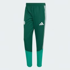 Spodnie reprezentacyjne Algieria 26. Zielone spodnie sportowe męskie Adidas, z materiału. Za 279.00 zł.