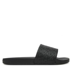 Klapki Calvin Klein. Czarne klapki damskie CALVIN KLEIN, bez wzorów, bez obcasa. Za 219.99 zł.