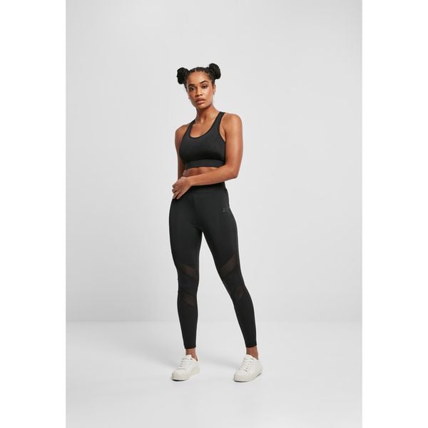 Biustonosz damski Urban Classics starter mesh. Czarne biustonosze sportowe damskie Urban Classics, bez wzorów, z meshu. W wyprzedaży za 110.50 zł.