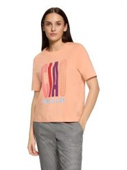 CARTOON Koszulka w kolorze brzoskwiniowym rozmiar: 42. Pomarańczowe bluzki damskie Cartoon, bez wzorów, z bawełny, bez kołnierzyka. Za 60.99 zł.