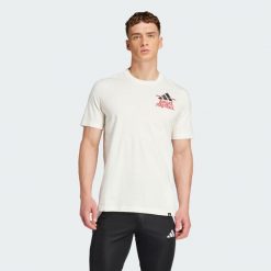 Koszulka Football Graphic. Czarne t-shirty sportowe męskie Adidas, xs, z bawełny, bez ramiączek, do piłki nożnej. W wyprzedaży za 111.30 zł.