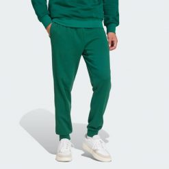 Spodnie Essentials Feel Cozy French Terry. Czarne spodnie dresowe męskie Adidas, z dresówki. Za 219.00 zł.