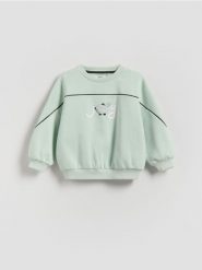 Bawełniana bluza - jasnozielony. Zielone bluzy i bluzki niemowlęce Reserved, bez wzorów, z bawełny, bez ramiączek, bez kaptura. Za 49.99 zł.