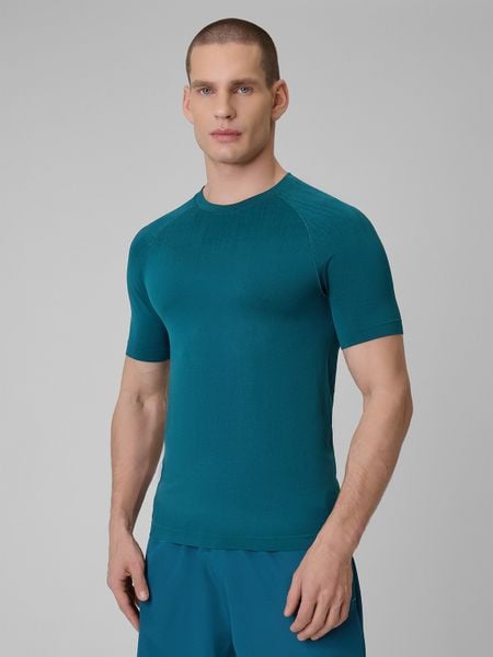 4F Koszulka treningowa slim bezszwowa męska - granatowa L/XL. Niebieskie t-shirty sportowe męskie 4f, l, ze skóry, bez ramiączek, na fitness i siłownię. Za 99.99 zł.