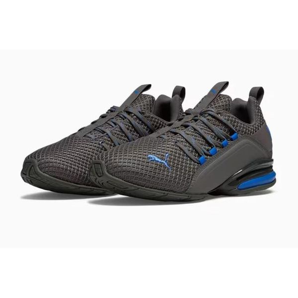 Buty Sportowe Męskie Puma Axelion Spark. Niebieskie buty sportowe na co dzień męskie Puma, z dresówki, bez zapięcia, trekkingowe. Za 166.00 zł.