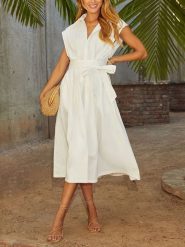 Milan Kiss Sukienka w kolorze białym rozmiar: M. Białe sukienki damskie Milan Kiss, na co dzień, m, bez wzorów, z bawełny, bez kołnierzyka, bez ramiączek, midi, proste. Za 179.22 zł.