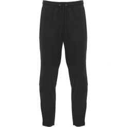 Spodnie Do Biegania Dla Dorosłych Unisex Neapolis. Niebieskie spodnie dresowe damskie ROLY, bez wzorów. Za 100.99 zł.
