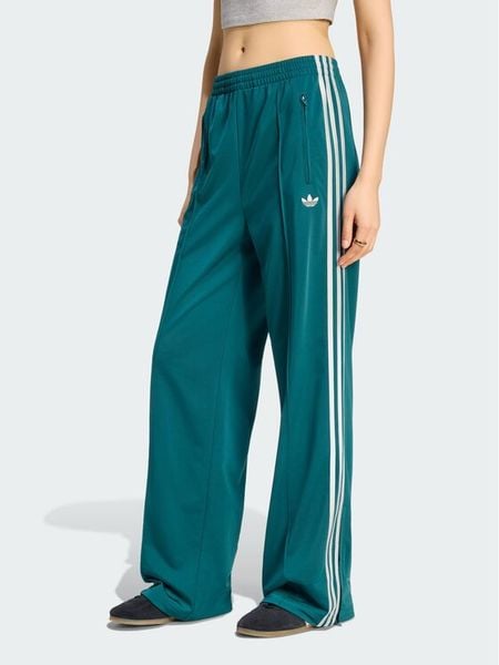 Adidas Spodnie dresowe Firebird Loose Tracksuit KS4672 Turkusowy Loose Fit. Niebieskie spodnie dresowe damskie Adidas, xs, bez wzorów, z dresówki. Za 208.99 zł.