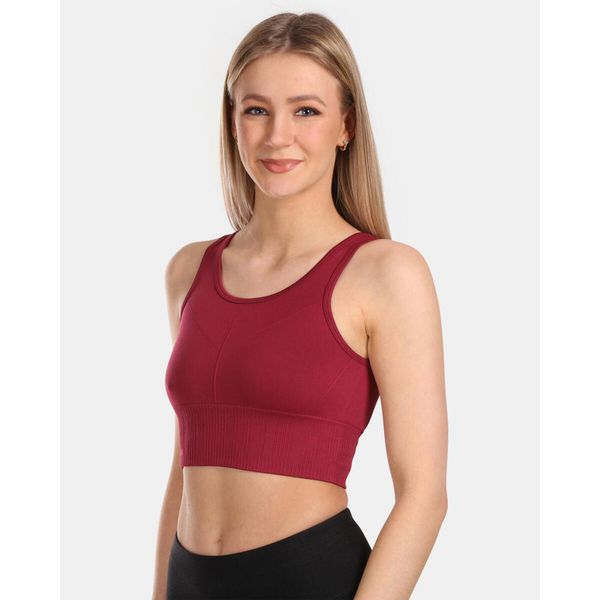 Damski bezszwowy crop top Kilpi LIARA-W. Czerwone topy sportowe damskie Kilpi, xs, bez wzorów, bez ramiączek. Za 112.21 zł.