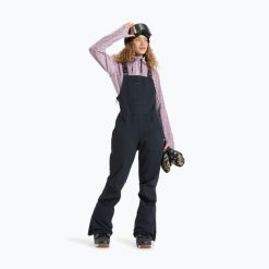 Spodnie narciarskie damskie ROXY Rideout Bib. Czarne spodnie materiałowe damskie Roxy, bez wzorów, z materiału. Za 1,250.60 zł.