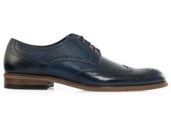 Granatowe męskie buty wizytowe - brogsy T147. Buty wizytowe męskie Modini Moda Męska, ze skóry, bez zapięcia. W wyprzedaży za 333.00 zł.