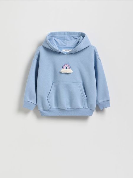 Bluza z aplikacją - niebieski. Niebieskie bluzy i bluzki niemowlęce Reserved, z aplikacjami, z bawełny, bez ramiączek, bez kaptura. Za 55.99 zł.