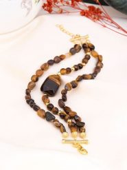 Pierres de Jade Pozłacana bransoletka z elementami ozdobnymi rozmiar: onesize. Brązowe bransoletki damskie Pierres de Jade, pozłacane. Za 43.99 zł.