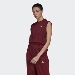 Koszulka damska Adidas Move Studio krótka top bordowa. Czerwone bluzki damskie Adidas, xs, bez wzorów, z bawełny, bez ramiączek. Za 92.00 zł.
