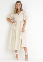 Beżowa Sukienka Maxi z Bawełny i Lnu z Ażurowymi Wstawkami i Gumką w Pasie Arada. Brązowe sukienki damskie Born2be, m, w ażurowe wzory, z bawełny, bez kołnierzyka, bez ramiączek, maxi, rozkloszowane. W wyprzedaży za 183.99 zł.