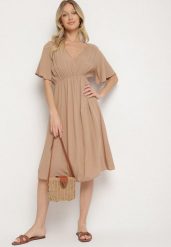 Ciemnobeżowa Bawełniana Sukienka o Rozkloszowanym Fasonie Liranelle. Brązowe sukienki damskie Born2be, na co dzień, na lato, l, bez wzorów, z bawełny, eleganckie, bez kołnierzyka, bez ramiączek, midi, rozkloszowane. W wyprzedaży za 51.99 zł.