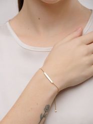 Pandora Pozłacana bransoletka z elementem ozdobnym rozmiar: 18. Żółte bransoletki damskie Pandora, pozłacane. Za 504.95 zł.
