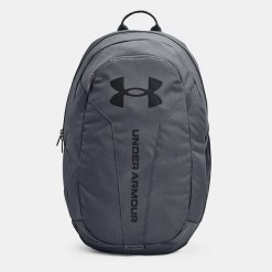 Plecak sportowy szkolny Under Armour Hustle Lite - 1364180-012. Szare plecaki damskie Under Armour, bez wzorów. Za 117.99 zł.