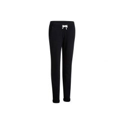 Spodnie slim Gym & Pilates 500 damskie. Czarne spodnie materiałowe damskie DOMYOS, l, z bawełny, na jogę i pilates. W wyprzedaży za 44.99 zł.