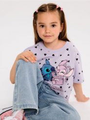 Koszulka Stitch - fioletowy. Fioletowe koszulki dziewczęce Sinsay, l, bez wzorów, bez ramiączek. Za 15.99 zł.