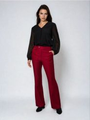 Spodnie flare - koralowy. Pomarańczowe spodnie materiałowe damskie Sinsay, bez wzorów. W wyprzedaży za 24.99 zł.