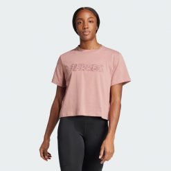 Koszulka Terrex Graphic. Czerwone bluzki damskie Adidas, l, bez wzorów, z bawełny, sportowe, bez kołnierzyka, bez ramiączek. W wyprzedaży za 95.40 zł.