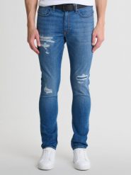 Jeansy męskie skinny z przetarciami niebieskie Deric 247. Niebieskie jeansy męskie Big Star. W wyprzedaży za 249.99 zł.