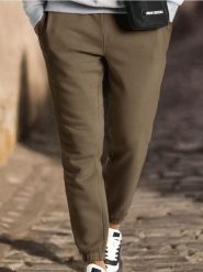 Spodnie dresowe - khaki. Brązowe spodnie sportowe męskie Sinsay, z dresówki. Za 29.99 zł.