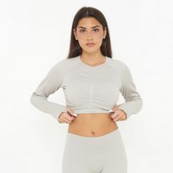 Crop Top do treningu IMALA z długim rękawem. Szare topy sportowe damskie Legea, s, bez wzorów, z elastanu, bez ramiączek. Za 80.00 zł.