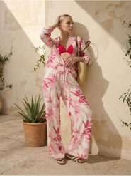 Wiskozowe spodnie wide leg ze wzorem kwiatowym - wielobarwny. Spodnie materiałowe damskie Sinsay, bez wzorów, z wiskozy. Za 39.99 zł.