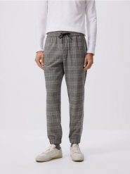 Spodnie jogger z lampasami - szary. Szare spodnie materiałowe męskie Reserved, bez wzorów, z tkaniny. Za 139.99 zł.