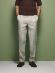 Lniane spodnie garniturowe - beżowy. Brązowe spodnie wizytowe męskie Reserved, z tkaniny. Za 199.99 zł.