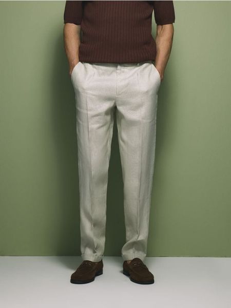 Lniane spodnie garniturowe - beżowy. Brązowe spodnie wizytowe męskie Reserved, z tkaniny. Za 199.99 zł.