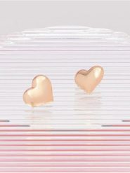 Kolczyki - złoty. Żółte kolczyki damskie Sinsay, złote. Za 7.99 zł.