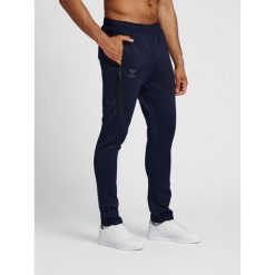 Jogging Hummel Cima Xk. Niebieskie szorty męskie HUMMEL, bez wzorów, z tkaniny, sportowe. Za 252.70 zł.