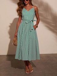 Milan Kiss Sukienka w kolorze zielonym rozmiar: S. Białe sukienki damskie Milan Kiss, na imprezę, s, bez wzorów, z tkaniny, bez kołnierzyka, bez ramiączek, maxi. Za 214.19 zł.