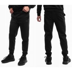 Spodnie Dresowe Męskie Fila Sportowe Dresy Treningowe Bawełniane. Czarne spodnie sportowe męskie Fila, z bawełny. Za 235.00 zł.