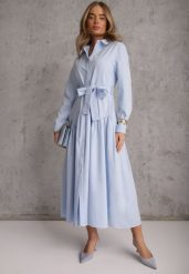 Niebieska Sukienka w Koszulowym Stylu z Wiskozą Bawełną i Paskiem Nerigunn. Niebieskie sukienki damskie Renee, na lato, l, bez wzorów, z bawełny, eleganckie, bez kołnierzyka, bez ramiączek, maxi, koszulowe. Za 199.99 zł.