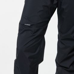 Spodnie do biegania w terenie przeciwdeszczowe damskie Kiprun Run 900 Rain. Czarne spodnie materiałowe damskie KIPRUN, bez wzorów, z elastanu, sportowe. Za 179.99 zł.