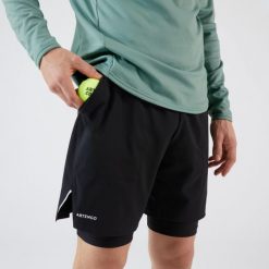 Spodenki do tenisa 2w1 męskie Artengo Thermic. Czarne szorty męskie ARTENGO, bez wzorów, sportowe. Za 69.99 zł.