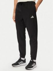 Adidas Spodnie dresowe Essentials Small Logo JM1775 Czarny Regular Fit. Czarne spodnie dresowe męskie Adidas, bez wzorów, z dresówki. Za 219.99 zł.