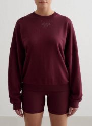 Damska bluza frotte, luźna, z okrągłym dekoltem Apparel Terry wiśniowa. Czerwone bluzy bez kaptura damskie Aim'n, xs, z dzianiny. Za 297.00 zł.