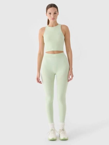 4F Legginsy trekkingowe w kolorze zielonym rozmiar: M/L. Zielone legginsy damskie 4f, l, bez wzorów, z materiału, z podwyższonym stanem, outdoorowe. Za 65.38 zł.