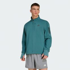 Kurtka Own The Run Winterized. Niebieskie kurtki treningowe męskie Adidas, xl, bez wzorów, do biegania, climawarm (adidas). Za 439.00 zł.