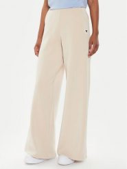Guess Spodnie dresowe V4YB07 KCAY2 Beżowy Relaxed Fit. Brązowe spodnie dresowe damskie Guess, l, z aplikacjami, z dresówki. Za 269.99 zł.