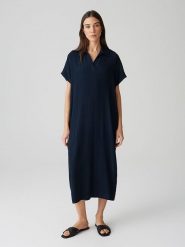 OPUS Sukienka w kolorze granatowym rozmiar: 36. Niebieskie sukienki damskie Opus, bez wzorów, z bawełny, bez kołnierzyka, bez ramiączek, midi. Za 143.99 zł.