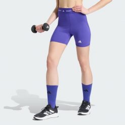 Krótkie legginsy TECHFIT. Czarne legginsy sportowe damskie Adidas, l, bez wzorów, z elastanu, z podwyższonym stanem, na fitness i siłownię, techfit (adidas). Za 119.00 zł.